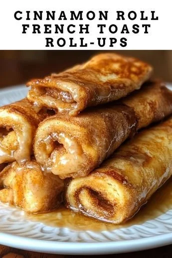 Cinnamon Roll French Toast Bites served on a plate with syrup and berries