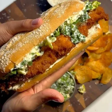 Crispy Chicken Caesar Sandwich with romaine and creamy dressing on fresh bread
