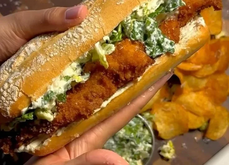 Crispy Chicken Caesar Sandwich with romaine and creamy dressing on fresh bread