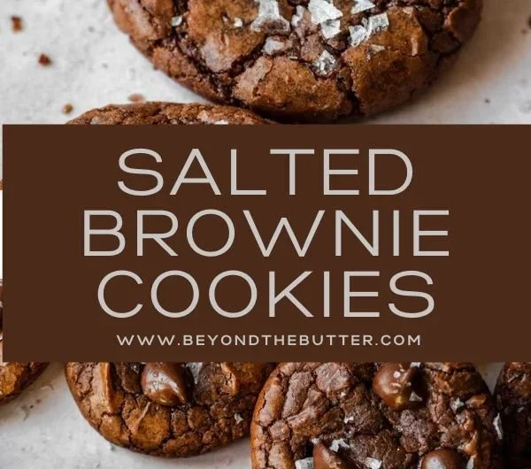 Delicious salted brownie cookies topped with sea salt on a baking sheet