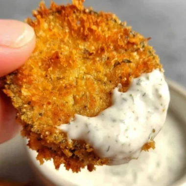 Air fryer fried pickles served in a bowl for a crunchy snack.