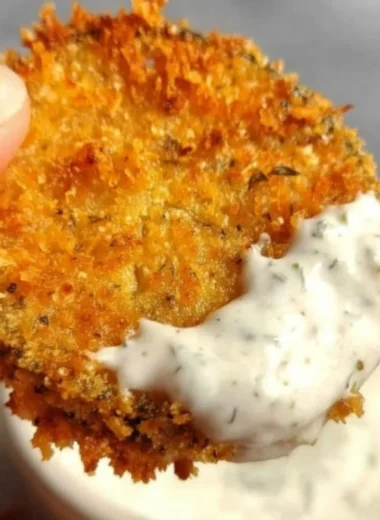 Air fryer fried pickles served in a bowl for a crunchy snack.