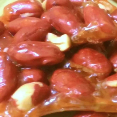 Delicious homemade peanut brittle served in a bowl