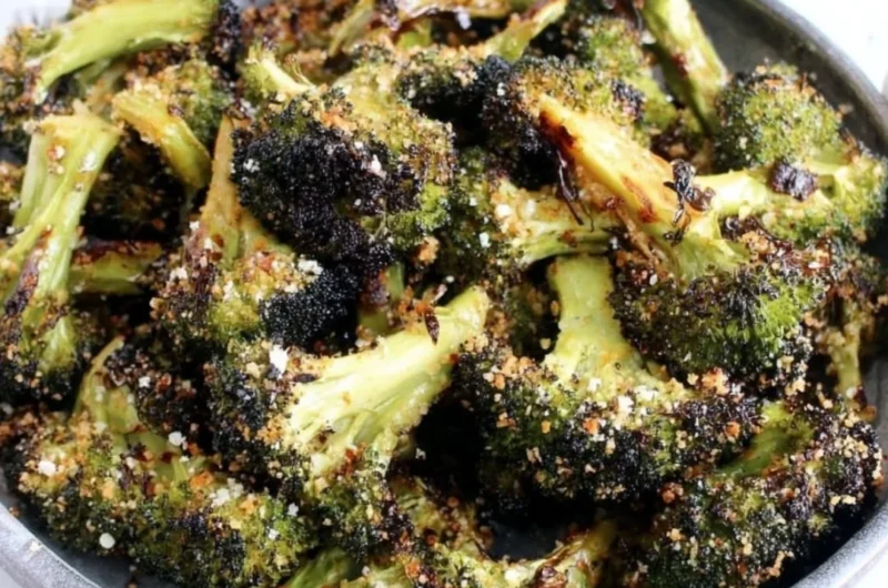Delicious roasted broccoli with lemon and garlic garnished on a plate