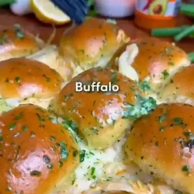 Buffalo Chicken Sliders on a platter with garnishes