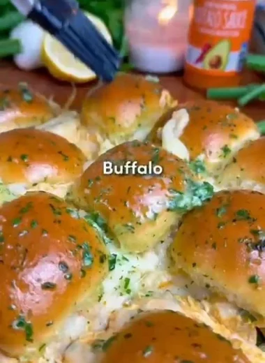 Buffalo Chicken Sliders on a platter with garnishes