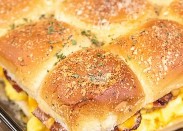 Delicious Crack Breakfast Sliders filled with eggs, cheese, and sausage