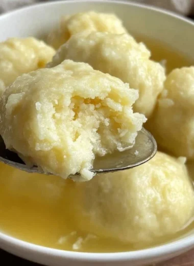 Delicious drop dumplings served with a rich sauce, ready to enjoy.