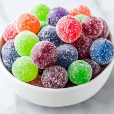 Delicious Kool-Aid Grapes coated in vibrant flavored powder.