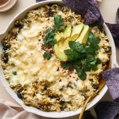 Salsa Verde Chicken & Rice Skillet served in a pan with fresh ingredients