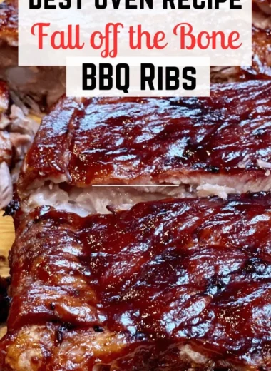 Delicious St. Louis ribs served with barbecue sauce and sides