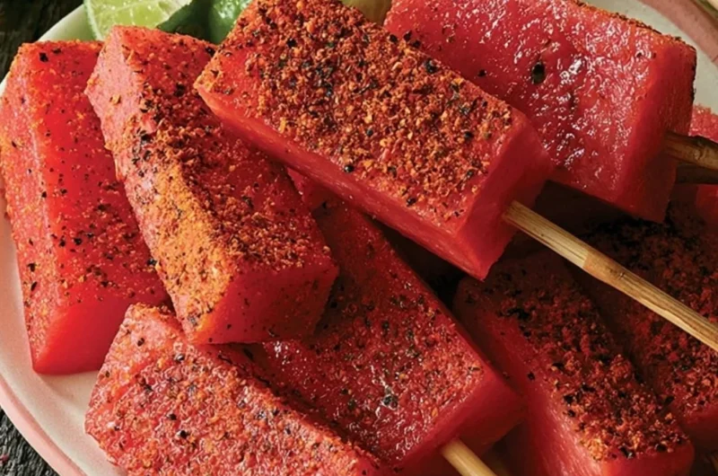Tequila-spiked fruit skewers with colorful fruits and zesty marinade