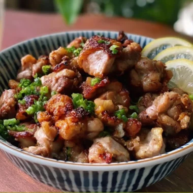 Yakitori-inspired salt and pepper chicken bites served on a platter