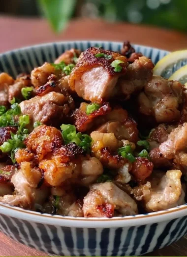 Yakitori-inspired salt and pepper chicken bites served on a platter