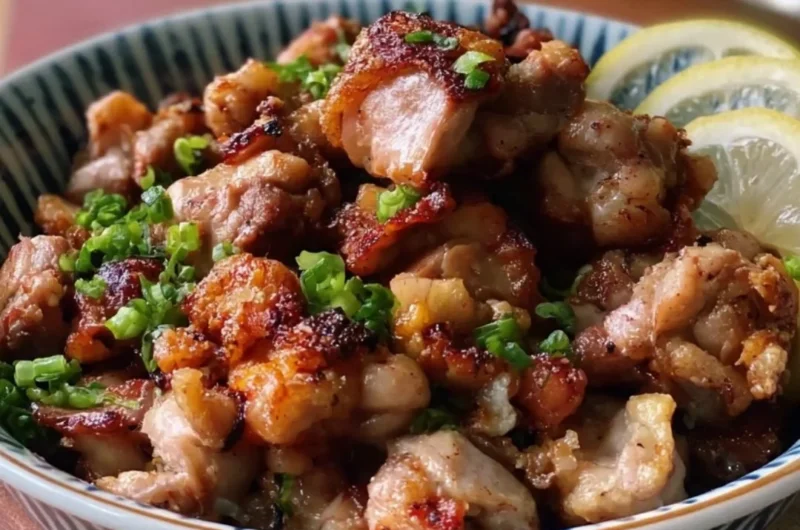 Yakitori-inspired salt and pepper chicken bites served on a platter
