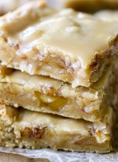 Cozy maple glazed apple blondies freshly baked and drizzled with maple glaze.