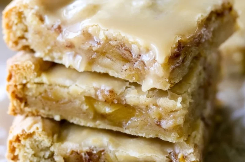 Cozy maple glazed apple blondies freshly baked and drizzled with maple glaze.