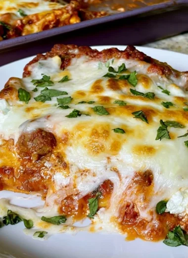 Cozy Sheet Pan Lasagna baked to perfection with layers of pasta and cheese.