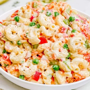 Creamy macaroni salad with vegetables in a bowl