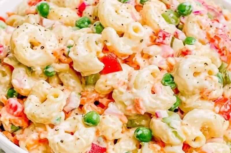 Creamy macaroni salad with vegetables in a bowl